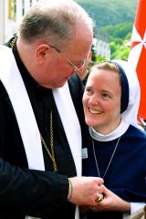 2011 Lourdes Pilgrimage - Archbishop Dolan with Malades (205/267)